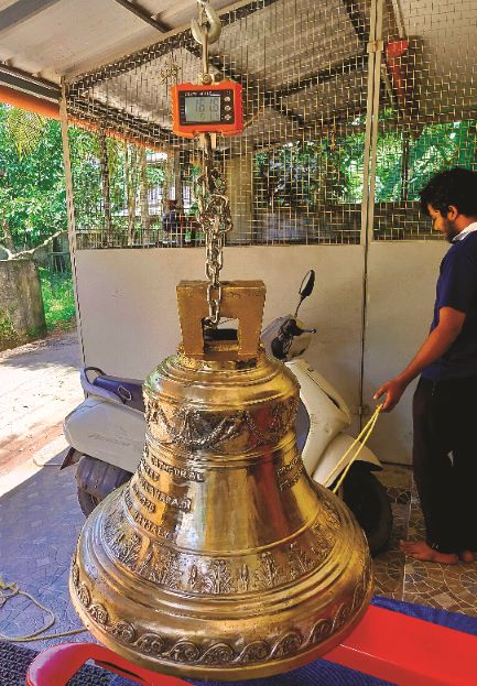 Madonna Bronze Bell being weighed on